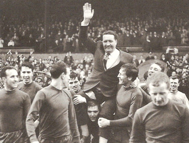 Jock Stein held aloft